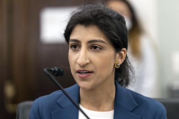 FILE - Lina Khan, then-nominee for Commissioner of the Federal Trade Commission (FTC), speaks during a Senate Committee on Commerce, Science, and Transportation confirmation hearing on Capitol Hill in Washington, April 21, 2021. Whether it is a fitness tracker, “smart” home appliances or the latest kids’ fad going viral in online videos, they all produce a trove of personal data for big tech companies. How that data is being used and protected has led to growing public concern and officials’ outrage. Now federal regulators are looking at drafting rules to crack down on what they call harmful commercial surveillance and lax data security. The FTC announced the initiative Thursday, Aug. 11, 2022. (Graeme Jennings/Washington Examiner via AP, Pool, File)