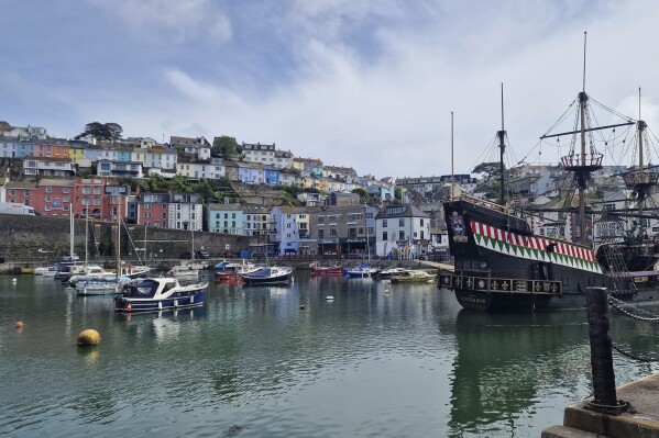 A general view of Brixham Harbour, in Brixham, Devon, Friday May 17, 2024. Around 16,000 homes and businesses in the Brixham area of Devon were told to boil water after cryptosporidium, a microscopic parasite that causes diarrhea, was found in the water. At least 46 cases of cryptosporidiosis have been confirmed and more than 100 other people have reported similar symptoms, the U.K. Health Security Agency said. Cases can last more than two weeks. (Piers Mucklejohn/PA via AP)