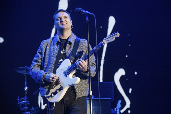 FILE - Nathan Willett of Cold War Kids performs at the 2017 KROQ Almost Acoustic Christmas at The Forum in Inglewood, Calif., on Dec. 9, 2017. Tennis has become a regular pastime for Willett, especially when he goes on the road with his California band. Almost 20 years after the band's inception, the best version of Willett includes his love for tennis, to go along with a deeper appreciation of his own connection to sports. (Photo by Amy Harris/Invision/AP, File)