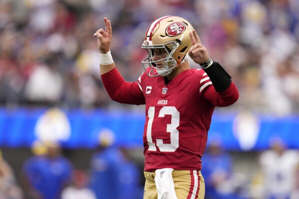 San Francisco 49ers quarterback Brock Purdy gestures before a snap during the first half of an NFL football game against the Los Angeles Rams Sunday, Sept. 17, 2023, in Inglewood, Calif. (AP Photo/Ashley Landis)