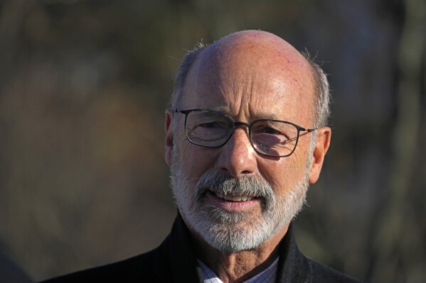FILE - Pennsylvania Governor Tom Wolf attends a dedication ceremony for the rebuilt Fern Hollow Bridge in Pittsburgh on Wednesday, Dec. 21, 2022. Pennsylvania saw a tenfold increase in deaths of older adults following an abuse or neglect complaint over the past few years, according to state data, and as COVID-19 ravaged the nation, calls for help mushroomed while local agencies struggled to keep caseworkers on staff.(AP Photo/Gene J. Puskar, File)