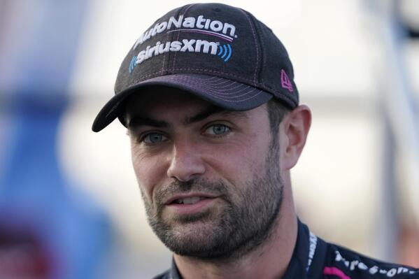 FILE - Jack Harvey is shown before the start of an IndyCar auto race at World Wide Technology Raceway in Madison, Ill., in this Saturday, Aug. 21, 2021, file photo. Rahal Letterman Lanigan Racing confirmed the worst kept secret in IndyCar on Monday, Oct. 11, 2021, when British driver Jack Harvey was officially added to its 2022 lineup. (AP Photo/Jeff Roberson, File)