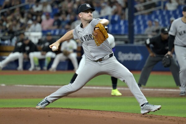 New York Yankees starter Clarke Schmidt pitches against the Tampa Bay Rays during the first inning of a baseball game Friday, May 10, 2024, in St. Petersburg, Fla. (AP Photo/Steve Nesius)