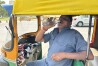An auto-rickshaw driver drinks water as he takes a break in New Delhi, India, Saturday, May 18, 2024. Swathes of northwest India sweltered under scorching temperatures on Saturday, with the capital New Delhi under a severe weather alert as extreme temperatures strike parts of the country. (AP Photo/Shonal Ganguly)