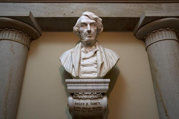 FILE - A marble bust of Chief Justice Roger Taney is displayed in the Old Supreme Court Chamber in the U.S. Capitol in Washington, on March 9, 2020. The House approved a bill on Dec. 14, 2020, that calls for removing the bust of Taney who wrote the infamous 1857 Dred Scott decision that upheld slavery and denied citizenship to Black Americans. (AP Photo/J. Scott Applewhite, File)