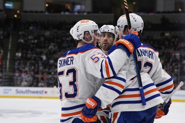 The Oilers beat the Sharks 3-2 despite losing Leon Draisaitl to an  undisclosed injury | AP News
