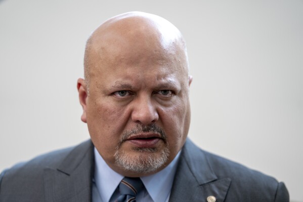 Karim Khan, Prosecutor of the International Criminal Court looks up prior to a press conference in The Hague, Netherlands, July 3, 2023. (AP Photo/Peter Dejong, File)