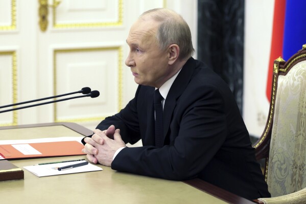 Russian President Vladimir Putin chairs a Security Council meeting in Moscow, Russia, Thursday, April 11, 2024. (Alexei Babushkin, Sputnik, Kremlin Pool Photo via AP)
