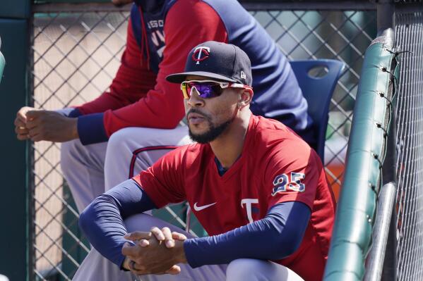 Minnesota Twins' Byron Buxton watches from the dugout during the seventh inning of a baseball game against the Detroit Tigers, Sunday, July 24, 2022, in Detroit. (AP Photo/Carlos Osorio)