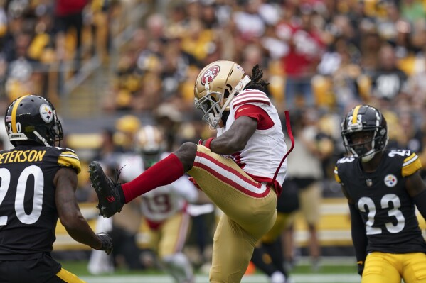 San Francisco 49ers wide receiver Brandon Aiyuk catches a touchdown against the Pittsburgh Steelers during the first half of an NFL football game Sunday, Sept. 10, 2023, in Pittsburgh. (AP Photo/Matt Freed)