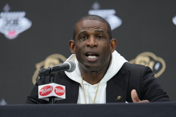 Colorado head coach Deion Sanders speaks during the Big 12 NCAA college football media days in Las Vegas, Wednesday, July 10, 2024. (AP Photo/Lucas Peltier)