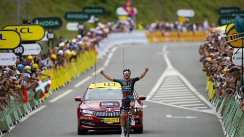Australia's Jai Hindley crosses the finish line to win the fifth stage of the Tour de France cycling race over 163 kilometers (101 miles) with start in Pau and finish in Laruns, France, Wednesday, July 5, 2023. (AP Photo/Thibault Camus)