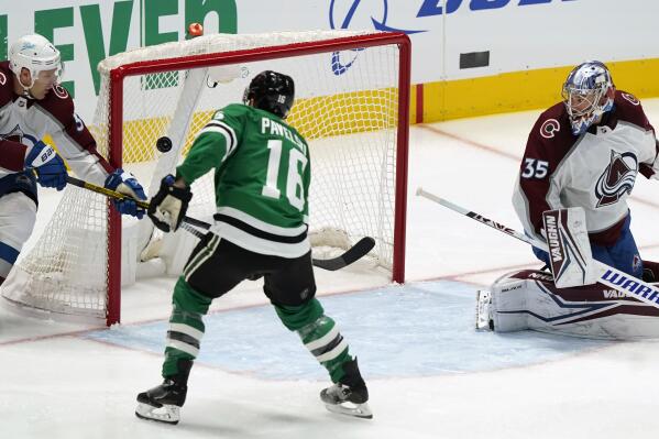 Dallas Stars center Joe Pavelski (16) scores a goal against Colorado Avalanche defenseman Jack Johnson (3) and goaltender Darcy Kuemper (35) during the first period of an NHL hockey game in Dallas, Friday, Nov. 26, 2021. (AP Photo/LM Otero)
