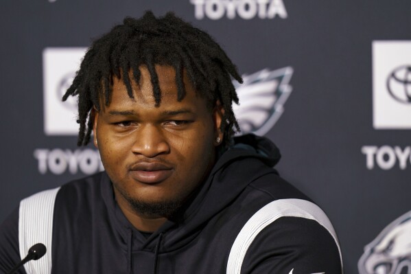 Philadelphia Eagles first round draft pick Jalen Carter, from the University of Georgia, takes questions from the media during NFL rookie football minicamp, Friday, May 5, 2023, in Philadelphia. Victoria S. Bowles, who was seriously injured in the January car crash that killed Georgia offensive lineman Devin Willock and an athletics staffer, has sued the school’s athletics association and former Bulldogs defensive tackle Jalen Carter for damages. (AP Photo/Chris Szagola)