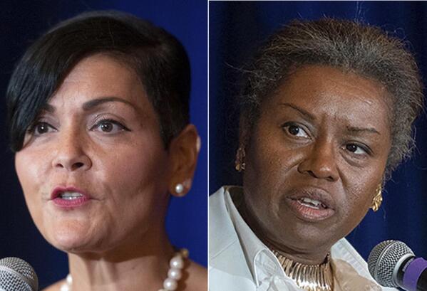 FILE - This photo combo shows from left, shows Virginia Democratic Lt. Governor candidate Hala Ayala and Virginia Republican Lt. Governor candidate Winsome Sears on Sept. 1, 2021 in McLean, Va.  (AP Photo/Cliff Owen, File)