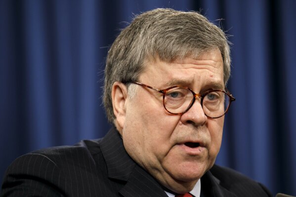 Attorney General William Barr speaks during a news conference, Monday, Feb. 10, 2020, at the Justice Department in Washington.  Four members of the Chinese military have been charged with breaking into the networks of the Equifax credit reporting agency and stealing the personal information of tens of millions of Americans, the Justice Department said Monday, blaming Beijing for one of the largest hacks in history.   (AP Photo/Jacquelyn Martin)