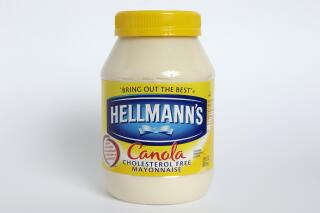 This Monday, Nov. 17 2014, photo shows a jar of Hellmann's "Canola Cholesterol Free Mayonnaise," in Walpole, Mass. The popular condiment brand is discontinuing sales of the mayonnaise in South Africa, not globally, as some social media users suggested. (AP Photo/Steven Senne)