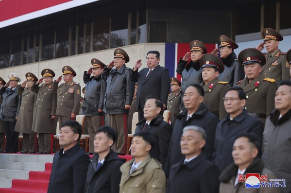 In this photo provided by the North Korean government, North Korean leader Kim Jong Un, center right, attends an opening ceremony of a defense exhibition in Pyongyang, North Korea Thursday, Nov. 21, 2024. Independent journalists were not given access to cover the event depicted in this image distributed by the North Korean government. The content of this image is as provided and cannot be independently verified. Korean language watermark on image as provided by source reads: "KCNA" which is the abbreviation for Korean Central News Agency. (Korean Central News Agency/Korea News Service via AP)