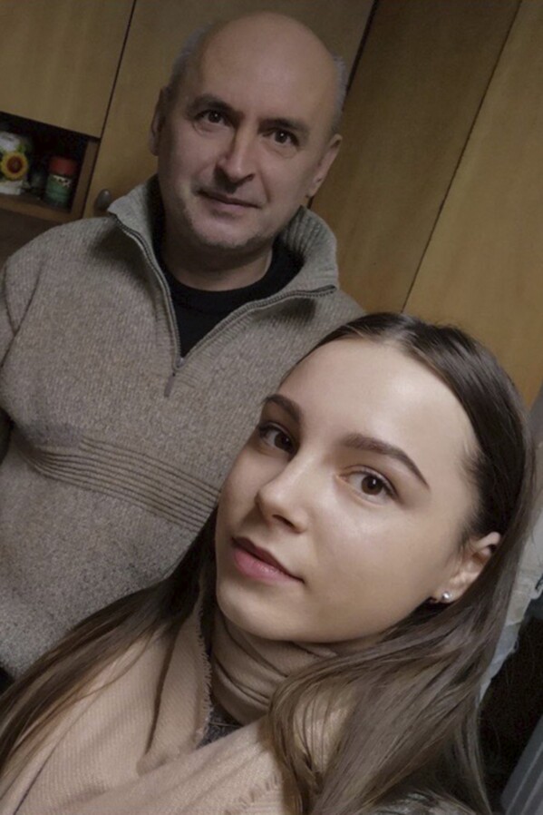 This selfie photo provided by Anna Vuiko shows her with her father, Roman Vuiko. Roman was one of the earliest civilians detained by Russian forces, in early March 2022. A former glass factory worker on disability, he had resisted when Russian soldiers tried to take over his home in suburban Kyiv, neighbors told his adult daughter. They drove a military truck into the yard, shattered the windows, cuffed the 50-year-old man and drove away. (Anna Vuiko via AP)