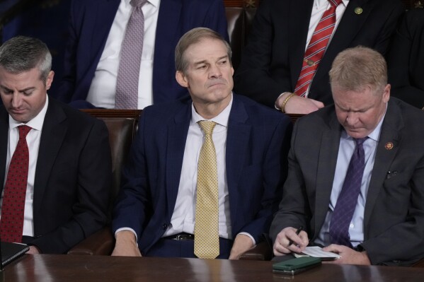 At the end of the first round of voting, Rep. Jim Jordan, R-Ohio, sits withRep. Warren Davidson, R-Ohio, right, as Republicans try to elect Jordan, a top Donald Trump ally, to be the new House speaker, at the Capitol in Washington, Tuesday, Oct. 17, 2023. (AP Photo/J. Scott Applewhite)