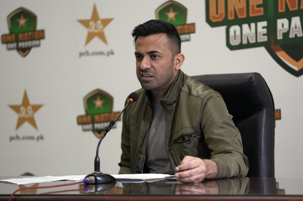Newly appointed chief selector Wahab Riaz, speaks during a press conference at the Gaddafi Stadium in Lahore, Pakistan, Monday, Nov. 20, 2021. Fast bowler Haris Rauf pulled out at the last minute as Pakistan named three uncapped players in an 18-member squad for the test tour of Australia on Monday. (AP Photo/K.M. Chaudary)