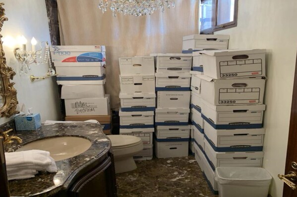 This image, contained in the indictment against former President Donald Trump, shows boxes of records stored in a bathroom and shower in the Lake Room at Trump's Mar-a-Lago estate in Palm Beach, Fla. (Justice Department via AP)