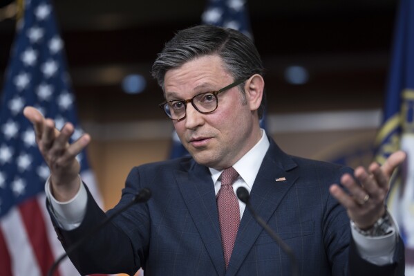 Speaker of the House Mike Johnson, R-La., and the House Republican leadership meet with reporters as lawmakers work to pass the final set of spending bills to avoid a partial government shutdown, at the Capitol in Washington, Wednesday, March 20, 2024. (AP Photo/J. Scott Applewhite)