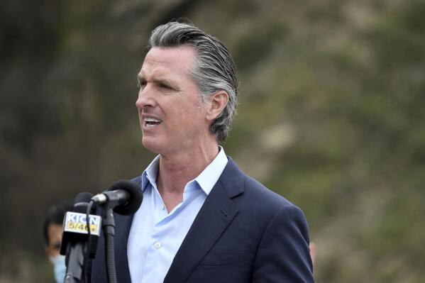 FILE - In this April 23, 2021, file photo, California Gov. Gavin Newsom speaks during a press conference about the newly reopened Highway 1 at Rat Creek near Big Sur, Calif. Organizers of the recall effort against Gov. Newsom collected enough valid signatures to qualify for the ballot. The California secretary of state’s office announced Monday, April 26, 2021 that more than 1.6 million signatures had been verified, about 100,000 more than needed to force a vote on the first-term Democrat. (AP Photo/Nic Coury, File)