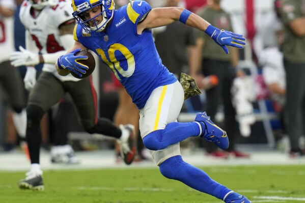 FILE - Los Angeles Rams wide receiver Cooper Kupp (10) runs to the end zone for a 69-yard touchdown reception during the first half of an NFL football game against the Tampa Bay Buccaneers, Nov. 6, 2022, in Tampa, Fla. Kupp, the 2021 Super Bowl MVP, had 75 catches for 812 yards in just nine games last year before an injury ended his season. (AP Photo/Chris O'Meara, File)