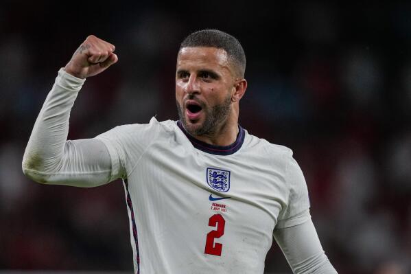 England's Kyle Walker celebrates after winning the Euro 2020 soccer championship semifinal match against Denmark at Wembley stadium in London, Wednesday, July 7, 2021. (AP Photo/Frank Augstein, Pool)