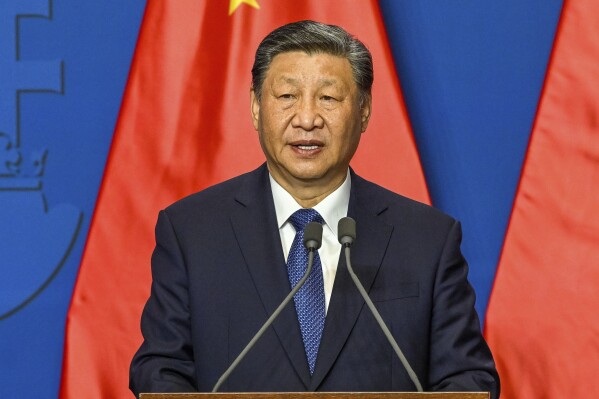FILE - Chinese President Xi Jinping speaks during his joint press conference with Hungarian Prime Minister Viktor Orban following their talks at the PM's office, the former Carmelite Monastery, in Budapest, Hungary, Thursday, May 9 2024. Most countries in the European Union are making efforts to “de-risk” their economies from perceived threats posed by China. But Hungary and Serbia have gone in the other direction. They are courting major Chinese investments in the belief that the world’s second-largest economy is essential for Europe’s future. (Szilard Koszticsak/MTI via AP, File)