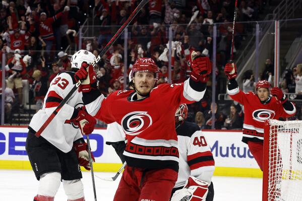 Carolina Hurricanes' Jesper Fast (71) celebrates his overtime goal against the New Jersey Devils in Game 5 of an NHL hockey Stanley Cup second-round playoff series in Raleigh, N.C., Thursday, May 11, 2023. (AP Photo/Karl B DeBlaker)