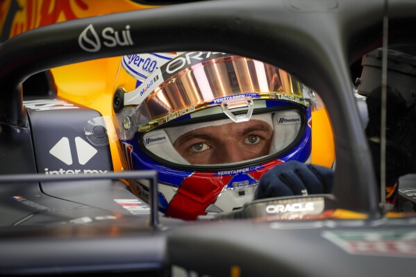 Red Bull driver Max Verstappen of the Netherlands sits in his car before a Formula One pre season test at the Bahrain International Circuit in Sakhir, Bahrain, Friday, Feb. 23, 2024. (AP Photo/Darko Bandic)