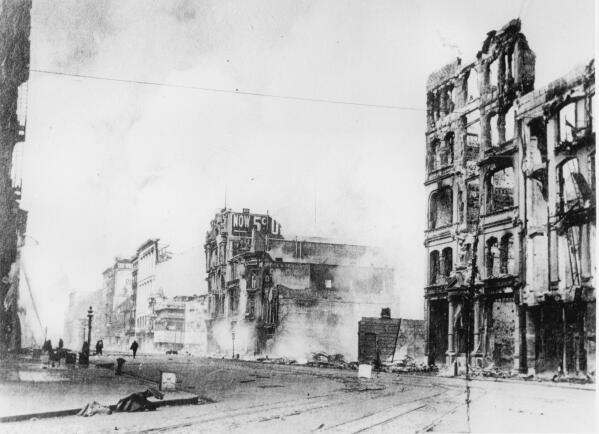 This photo, taken later in the day following the earthquake on Wednesday, April 18, 1906, shows the damage caused by the natural disaster along a broad avenue in San Francisco, Ca.  (AP Photo)