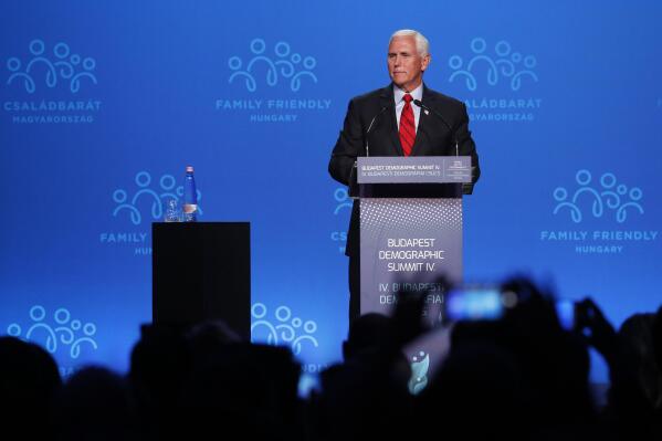 Former US Vice President Mike Pence holds a speech during the 4th Budapest Demographic Summit in Budapest, Hungary, Thursday, Sept. 23, 2021. The biannual demographic summit, which was first organized in 2015, offers a forum for "pro-family thinker" decision-makers, scientists, researchers, and church representatives of the same sort to exchange their thoughts about connections between demographics and sustainability. (AP Photo/Laszlo Balogh)