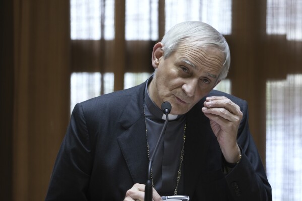 FILE - Cardinal Matteo Zuppi, head of the CEI (Italian Conference of Bishops) speaks during a press conference at The Vatican, on May 25, 2023. Pope Francis’ peace envoy arrived in Moscow on Tuesday in hopes of helping find “a solution to the tragic current situation” of the war in Ukraine, weeks after making a preliminary visit to Kyiv, the Vatican said. The mission by Cardinal Matteo Zuppi, a veteran of the Catholic Church’s peace initiatives, comes as the Kremlin is reeling from the weekend armed rebellion led by mercenary chief Yevgeny Prigozhin. Russia has since dropped charges against Prigozhin and others who took part in the brief rebellion. (AP Photo/Domenico Stinellis, File)