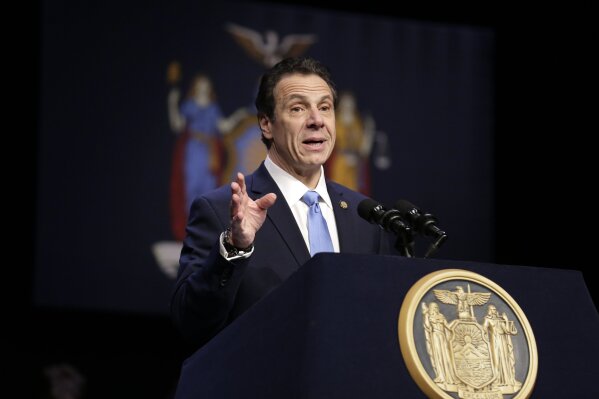 FILE - In this Feb. 25, 2019 file photo, New York Gov. Andrew Cuomo speaks during a bill signing ceremony in New York. Cuomo says his state will file a lawsuit challenging the Trump administration's plan to block New Yorkers from enrolling in "trusted traveler" programs. Federal officials say they took the step because of a new New York law barring immigrant agents from getting access to state motor vehicle records. (AP Photo/Seth Wenig, File)