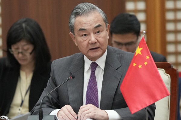 Chinese Foreign Minister Wang Yi speaks during the trilateral foreign ministers' meeting with South Korea and Japan, in Busan, South Korea, Sunday, Nov. 26, 2023. (APPhoto/Ahn Young-joon. Pool)