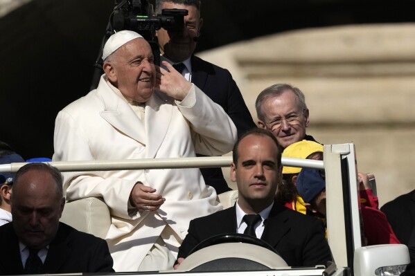 Pope Francis arrives for an audience with Azione Cattolica (Catholic Action) pilgrims and faithful in St. Peter's Square, at the Vatican, Thursday, April 25, 2024. (AP Photo/Alessandra Tarantino)