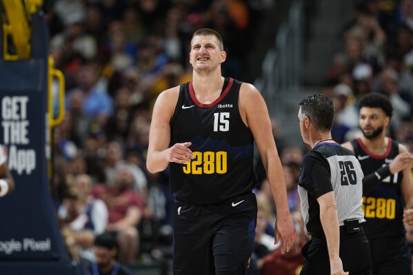 Denver Nuggets center Nikola Jokic drops back to defend during the second half of Game 2 of an NBA basketball second-round playoff series against the Minnesota Timberwolves, Monday, May 6, 2024, in Denver. (AP Photo/David Zalubowski)