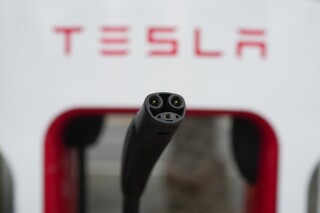 How does an EV charger plug work? A high-level look into the Tesla