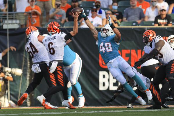 Burrow returns for Bengals as Dolphins rally for win