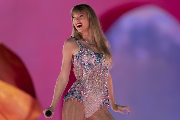 REMOVES INCORRECT SECOND SENTENCE FILE - Taylor Swift performs during "The Eras Tour," Friday, May 5, 2023, at Nissan Stadium in Nashville, Tenn. She leads the 2023 nominations with eight — seven for her “Anti-Hero” music video and the Artist of the Year category MTV announced on Tuesday, Aug. 8, 2023. (AP Photo/George Walker IV, File)
