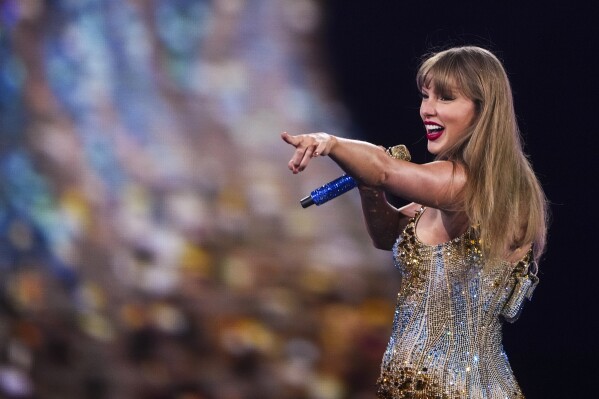 Taylor Swift performs during "The Eras Tour" on Friday, Dec. 6, 2024, in Vancouver, British Columbia. (AP Photo/Lindsey Wasson)