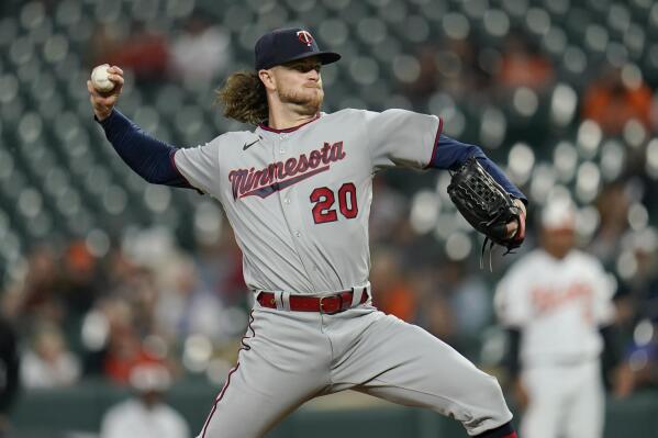 Minnesota Twins starting pitcher Chris Paddack throws a pitch to the against the Baltimore Orioles during the fourth inning of a baseball game, Monday, May 2, 2022, in Baltimore. (AP Photo/Julio Cortez)