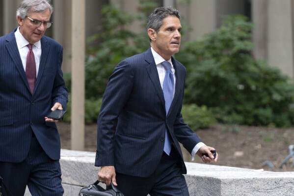 Former President Donald Trump attorney John Lauro arrives at the E. Barrett Prettyman U.S. Federal Courthouse, Monday, Aug. 28, 2023, in Washington. (AP Photo/Jose Luis Magana)