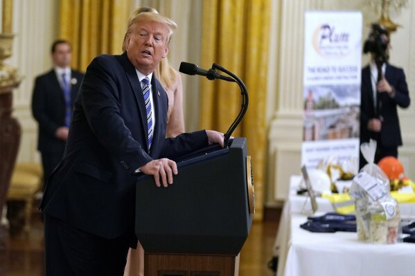 President Donald Trump speaks during an event about the Paycheck Protection Program used to support small businesses during the coronavirus outbreak, in the East Room of the White House, April 28, 2020, in Washington. (AP Photo/Evan Vucci)