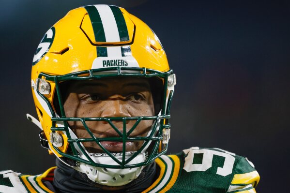 Green Bay Packers defensive tackle Kenny Clark (97) walks on the field before a NFL football game against the New Orleans Saints Monday, Dec. 23, 2024, in Green Bay, Wis. (AP Photo/Jeffrey Phelps, File)