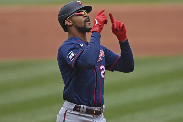 Minnesota Twins' Byron Buxton (25) celebrates after hitting a solo home run off Cleveland Indians starting pitcher Logan Allen in the first inning of a baseball game, Wednesday, April 28, 2021, in Cleveland. (AP Photo/David Dermer)