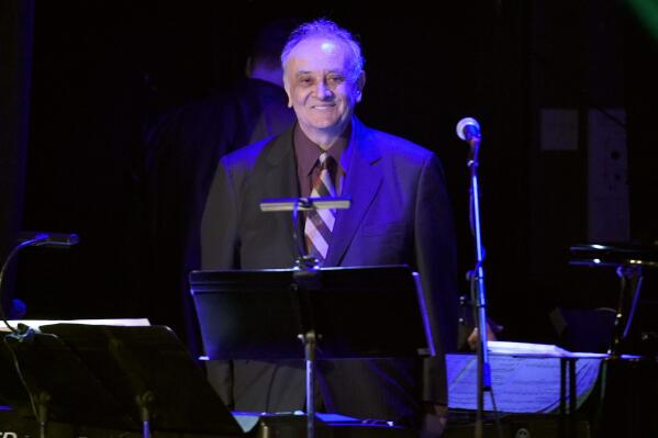 FILE - Angelo Badalamenti performs at the David Lynch Foundation Music Celebration at the Theatre at Ace Hotel on April 1, 2015, in Los Angeles. Badalamenti, the composer best known for creating otherworldly scores for many David Lynch productions, from “Blue Velvet” and “Twin Peaks” to “Mulholland Drive,” has died. He died of natural causes on Sunday, Dec. 11, 2022, his family said in a statement. He was 85. (Photo by Chris Pizzello/Invision/AP, File)